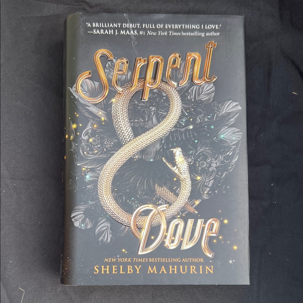 Serpent & Dove Hardcover Book